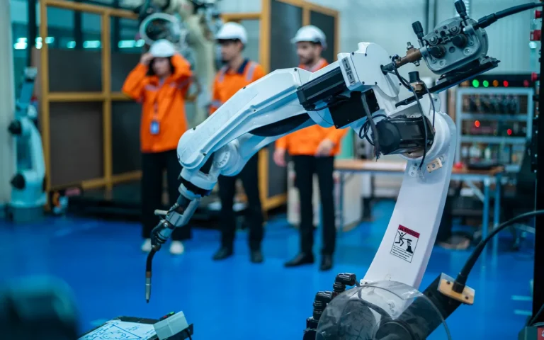 a-group-of-robotics-engineers-working-with-program